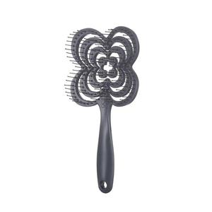 หวีจัดแต่งทรงผมแบบเปียกและแห้ง ใช้ได้สองแบบ ช่วยเพิ่มวอลลุ่ม ทรงกลม ปลายหวีแบบเข็ม แผ่นหลังโปร่ง รูปทรงใบโคลเวอร์สี่แฉก - Product Image 5