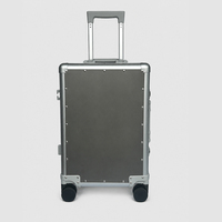 Valise à roulettes rigide ultra-légère en alliage de titane et d'aluminium de qualité OEM pour les acheteurs de marques de luxe