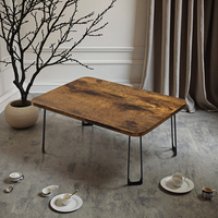 Table basse de salon en aluminium pliable de style japonais avec un design minimaliste moderne