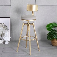 Table de bar moderne de luxe avec deux tabourets hauts pivotants, structure en métal, pour la maison, les hôtels, les centres commerciaux dans un décor de salle à manger élégant