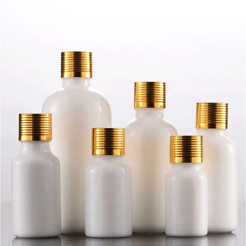 Venda quente garrafa de cosméticos para 50ml branco pérola garrafa de vidro frasco óleo essencial com tampa de alumínio dourado