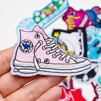 Patch en dentelle thermocollant personnalisé en forme de dessin animé pour skateboard, en toile écologique, avec logo brodé à l'ordinateur, tendance mode
