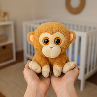 Niedliches Großäugiges Affen-Plüschtier Weiches Gelbes Kuscheltier für Kinder Sitzendes Rundgesichtiges Plüsch-Haustier OEM Kundenspezifischer Plüschtier-Hersteller