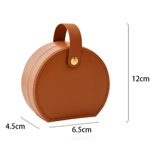 Nouvelle boîte à bijoux sac à main PU idéale pour les voyages. La section semi-circulaire s'adapte aux bagues, colliers, boucles d'oreilles, etc. Vente en gros disponible. - Product Image 2