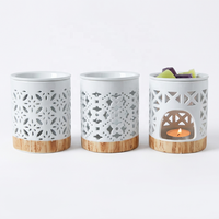 Brûleur d'huiles essentielles en céramique blanche de luxe, motif floral ajouré, support de bougie chauffe-plat, diffuseur de cire aromatique pour la décoration intérieure