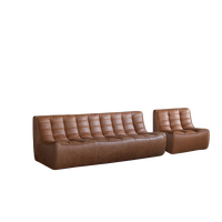 Minimalistisches Ecksofa aus Kunstleder mit quadratischen Ecken, modular, wandelbar, getuftet, Holzbeine, Wohnzimmermöbel