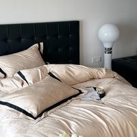 Ensemble de literie quatre pièces en coton longue fibre 100 fils, style luxe léger haut de gamme, jacquard satiné, housse de couette et drap