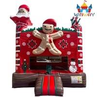 Château gonflable de Noël en PVC en gros avec motif Bonhomme en pain d'épices pour fêtes de Noël et événements festifs