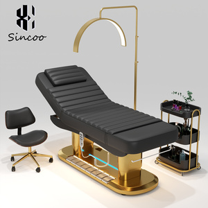Meubles de salon de beauté de luxe modernes avec commande au pied LED, lit de soin du visage électrique noir, lit de massage facial médical - Product Image 1