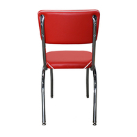 Chaise rembourrée rouge vintage avec passepoil blanc, pieds en métal chromé, mobilier de style rétro pour restaurant