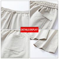 Pantalon d'été tissé pour homme en polyester, perforé au laser, anti-plis, séchage rapide, respirant, léger, personnalisable avec logo – Marque privée