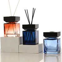Bouteille diffuseur en verre de 100 ml de forme carrée avec bouchon et joint à brosse pour huiles essentielles d'aromathérapie
