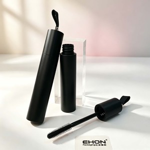 Tube de mascara vide en PETG noir mat avec bouchon décoré d'un ruban, flacon cylindrique en plastique, conteneur cosmétique personnalisé avec logo - Product Image 1
