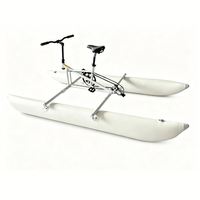Vélo aquatique gonflable cylindrique à pédales, monoplace, avec cadre en aluminium, adapté aux eaux peu profondes, disponible depuis Lumark en Chine, en stock.