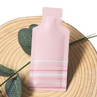Nouveau design de sac distributeur de miel en forme de bouteille en aluminium sac sachet de gel énergie fruits sac d'échantillon cosmétique portable