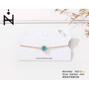 Pulsera de Acero Inoxidable en Tono Dorado con Circonita Azul de Corte Redondo, Cadena Clásica, Joyería Unisex para Regalo - Product Image 1