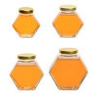 Vente en gros directe d'usine, pot à miel en verre hermétique, verre transparent de qualité alimentaire, couvercle à vis en métal, pot réutilisable pour le stockage du miel