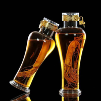 Bouteille de vin à bulles de ginseng transparente en verre borosilicate de luxe de 1000 ml avec des verrous et des couvercles métalliques pour boîte cadeau