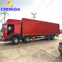 Camion de transport de marchandises Howo d'occasion, 10 roues, 371 CV, châssis, fourgon, clôture, à vendre