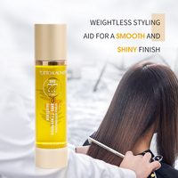 Sérum réparateur de cheveux personnalisé huile d'argan de marque privée huile de jojoba marocaine protection thermique sérum lisse pour cheveux crépus