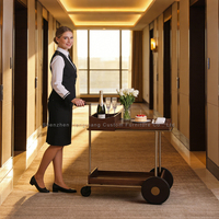 Chariot de bar roulant de luxe à 4 roues en bois et laiton, à 2 niveaux avec plateau à lattes, pour hôtel, maison et table d'appoint de salle à manger