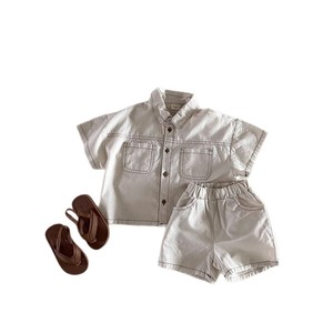 Nuovi arrivi estivi in stile coreano: set due pezzi in morbido denim con cuciture visibili, tinta unita, per ragazzi e ragazze. - Product Image 5