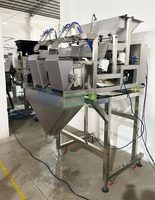 Machine de pesage linéaire à 2 têtes de 7,5 L pour gâteaux de riz, bonbons gélifiés, bonbons durs, fèves de chocolat et bonbons à la gelée