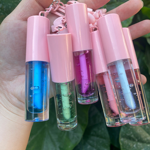 ผู้จำหน่ายลิปออยล์แบบขายส่ง รับผลิตแบรนด์ส่วนตัว ลิปออยล์วีแกน บำรุงริมฝีปากชุ่มชื้น กลิ่นมิ้นท์ พร้อมพวงกุญแจ - Product Image 3