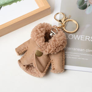 Wholesale New Small Cartoon <b>Doll</b> Safe LED Copper Portable Keychains and Car Pendants - Product Image 6