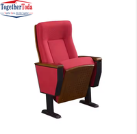 Chaise de théâtre rotative rembourrée en tissu rouge élégant et pratique avec bureau en bois rabattable pour auditoriums et conférences