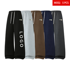 Pantalon de sport pour homme en gros ODM, 100 % polyester respirant, teint uni, coupe ample, jambe large, décontracté, taille mi-haute, cordon élastique, poches - Product Image 1