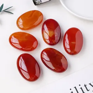 Wholesale Natural Healing Crystal Red Agate Palm Stone Hot Compress Stone Carved Crystal Massage Stone