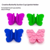 Support de téléphone multifonction en silicone à ventouse style papillon, support de rouge à lèvres anti-choc pour utilisation au lit, pour rouge à lèvres et brillant à lèvres