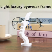 Support de lunettes créatif et moderne en forme de visage, support de bureau au design irrégulier, motif uni, simple et amusant
