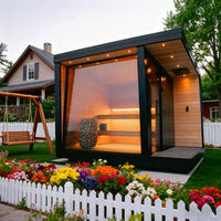 Sauna extérieur en bois de cèdre rouge et de pruche avec poêle à pierres chaudes