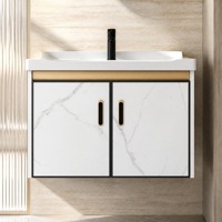 Meuble-lavabo mural Calacatta blanc en aluminium nid d'abeille avec finition dorée, miroir double porte, étagères latérales et cadre noir