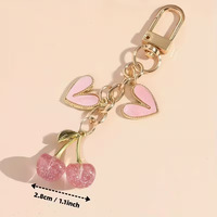 KC1377 Porte-monnaie, porte-clés et pendentif de sac en alliage métallique avec impression numérique, motif Cœur Cerise et Perle, tendance, populaire à l'international, vente en gros