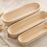 Banneton rond en rotin naturel, design artisanal, pour pain au levain et usage en boulangerie