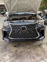 Mise à niveau vers le kit carrosserie de style Lexus avec les ensembles de pare-chocs avant et arrière pour les pièces de voiture Toyota Fortuner 2012-2015