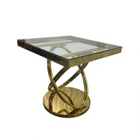 Articles de fête très demandés en usine : table à gâteau circulaire en acier inoxydable avec plateau en verre.