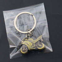 Porte-clés en alliage de zinc pour moto, pendentif casque 3D créatif, porte-clés moto, pendentif pour sac à dos