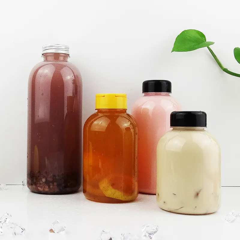 400ml 500ml 600ml 1000ml Bouteilles de jus en plastique Bouteilles de thé Boba Bouteilles de thé au lait jetables Bouteille PET 1 litre avec bouchon