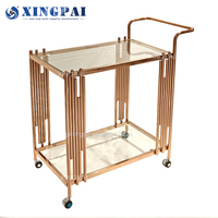 Chariot à thé de luxe XINGPAI à 2 niveaux en acier inoxydable rose doré avec roues, équipement de restauration commercial, buffet