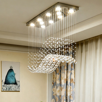 Table à manger rectangulaire de luxe DUOMEIJU avec cadre chromé et lustre LED en cristal K9 en forme de goutte de pluie