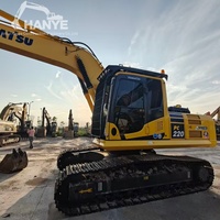 Machine de terrassement Komatsu PC220 d'occasion à prix abordable, système hydraulique intégré à économie d'énergie, idéale pour les projets de terrassement à grande échelle