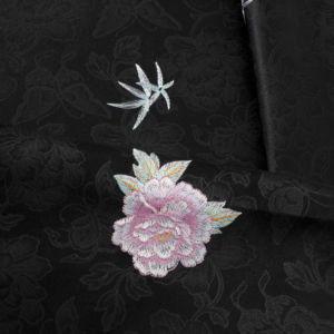 <span class=keywords><strong>2026</strong></span>新款高级中国提花刺绣面料纬编涤纶编织工艺适合婚礼女童现货商品 - Product Image 6