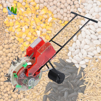 Mini roue de semis de précision à une rangée manuelle pousser à la main semences de maïs planteur de maïs Machine de plantation avec engrais