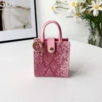 Mini sac antichoc en cuir PU motif peau de serpent, pendentif pour écouteurs, rouge à lèvres, porte-clés de voiture, doux et durable, cadeau pour femme