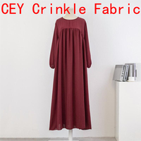 Robe pull ample à col rond et manches longues de couleur unie pour femmes musulmanes, grande taille, longueur au-dessus du genou, style modeste, vente en gros Moyen-Orient