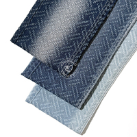 Tissu en denim crocheté bleu 9,5 oz, 70 % coton, avec traitement perforé, vente en gros